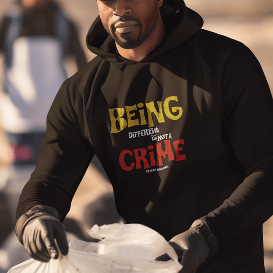 Model wearing black hoodie featuring bold statement graphic “Being Different Is Not a Crime,” unisex motivational streetwear by LostLogicCo Canada