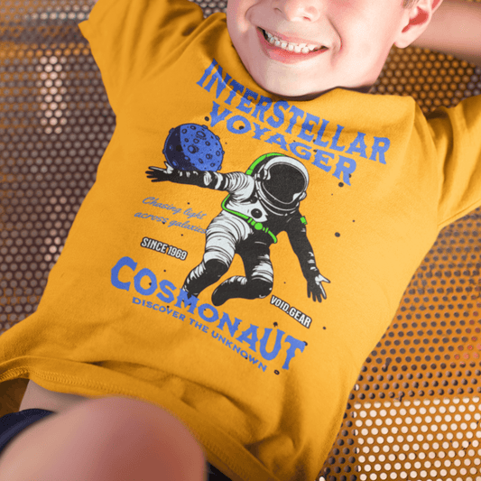 Child wearing youth graphic t-shirt with “Interstellar Voyager Cosmonaut” astronaut design, casual cotton-poly tee by LostLogicCo Canada