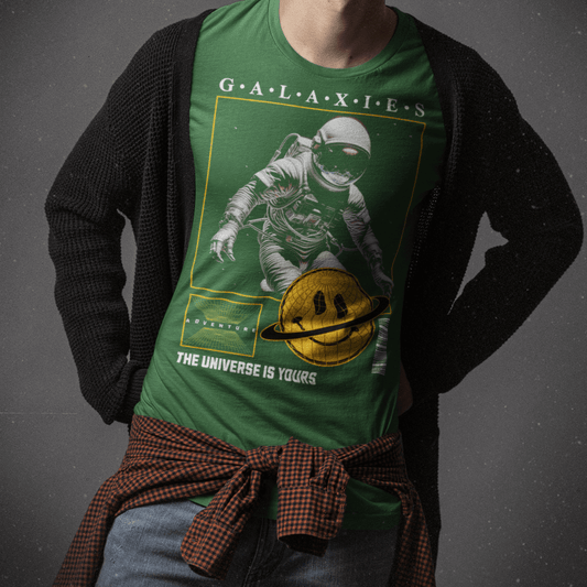 Youth wearing “Galaxies” kids astronaut t-shirt with cosmic design, sporty moisture-wicking youth tee by LostLogicCo Canada