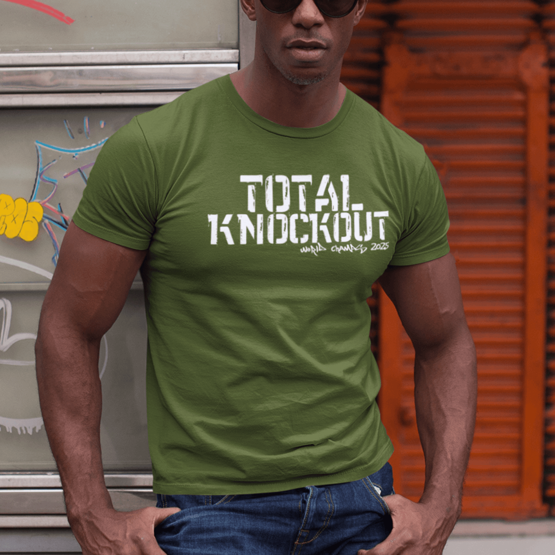 Model wearing unisex typography t-shirt with “Total Knockout” bold combat design, casual cotton tee by LostLogicCo Canada
