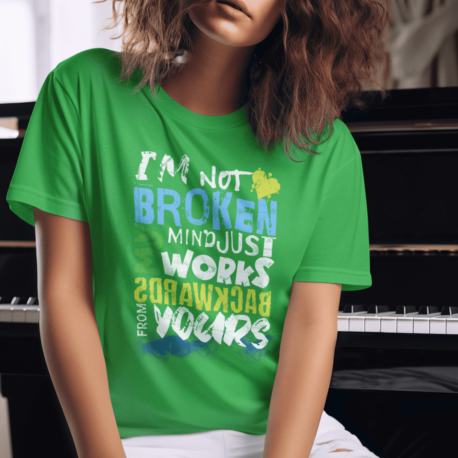 Model wearing unisex typography t-shirt with “I’m Not Broken My Mind Works Backwards From Yours” design, casual softstyle cotton tee by LostLogicCo Canada