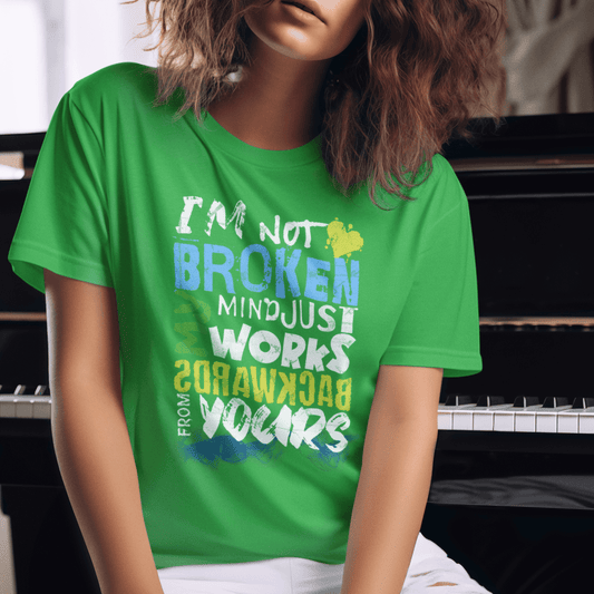 Model wearing unisex typography t-shirt with “I’m Not Broken My Mind Works Backwards From Yours” design, casual softstyle cotton tee by LostLogicCo Canada