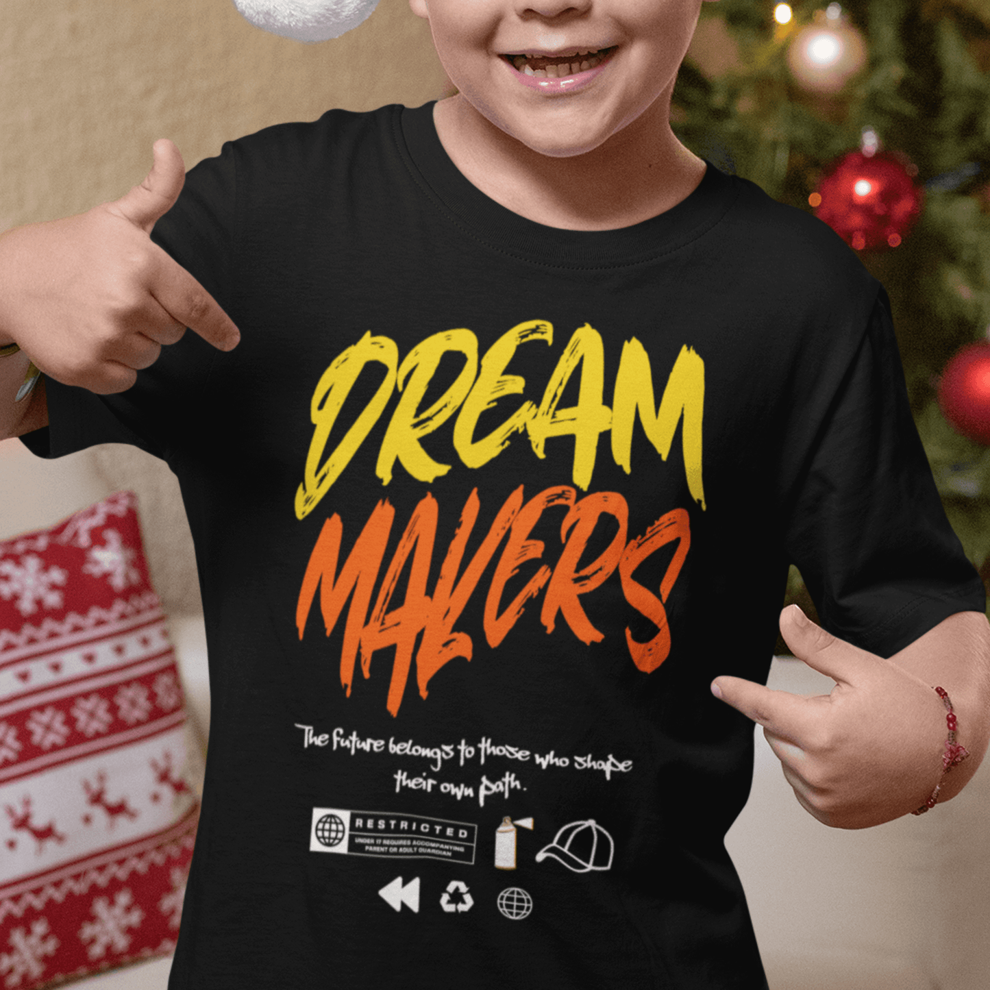 Child wearing “Dream Makers” motivational typography t-shirt, soft cotton youth tee by LostLogicCo Canada