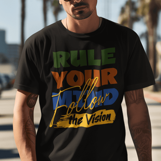 Model wearing unisex typography t-shirt with “Rule Your Mind Follow the Vision” bold design, casual cotton tee by LostLogicCo Canada