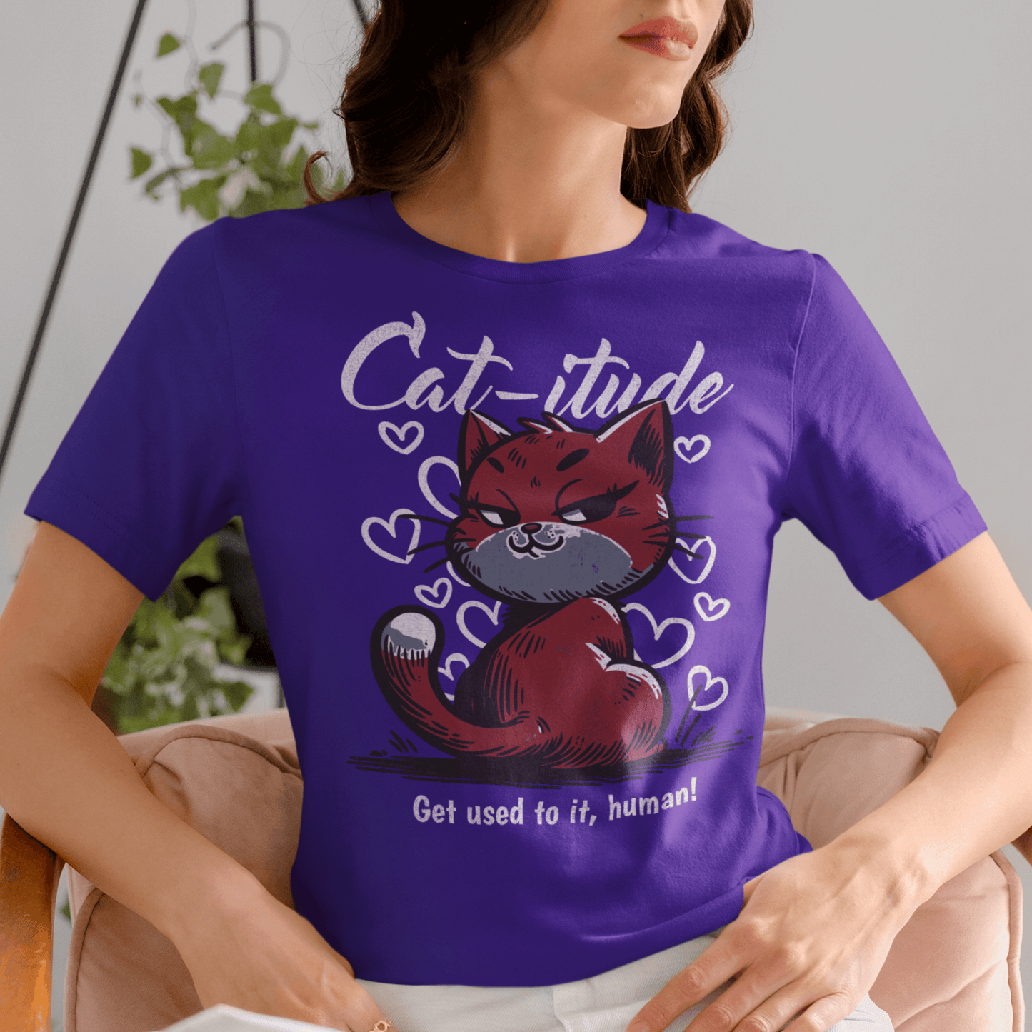 Model wearing “Cat-itude Get Used to It Human” funny cat t-shirt with red cat graphic and bold typography, unisex sports tee by LostLogicCo Canada