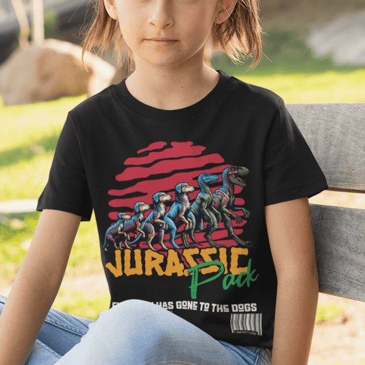 Child wearing youth “Jurassic Pack” dinosaur graphic t-shirt, casual sports tee by LostLogicCo Canada