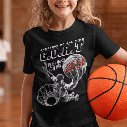 Child wearing youth basketball t-shirt with “G.O.A.T Slam Dunk 23” graphic design, casual short sleeve sports tee by LostLogicCo Canada