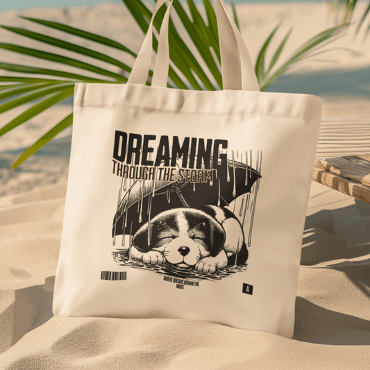 Eco tote bag with “Dreaming Through the Storm” design showing a sleeping puppy under an umbrella, printed on organic cotton by LostLogicCo Canada.