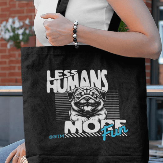 Eco tote bag with “Less Humans More Fun” funny pug design in white and blue on black organic cotton by LostLogicCo Canada.