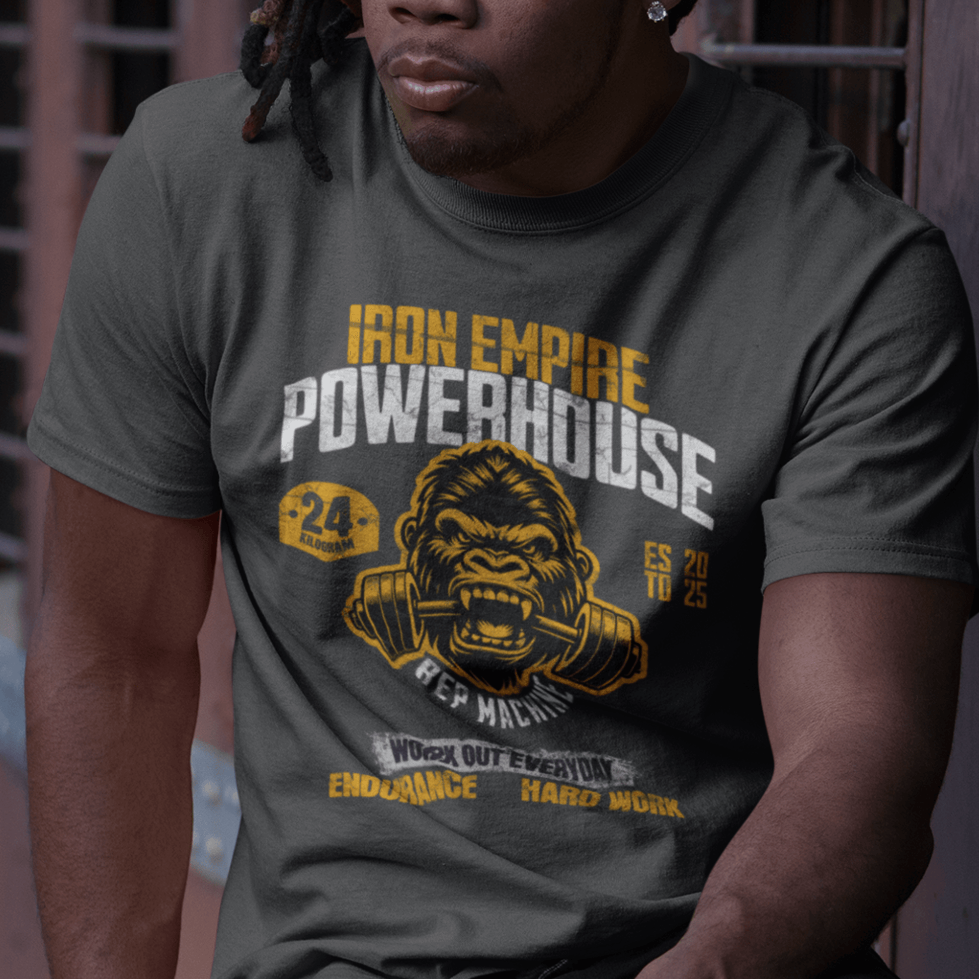 Model wearing unisex gym graphic t-shirt with “Iron Empire Powerhouse” gorilla design, casual cotton tee by LostLogicCo Canada