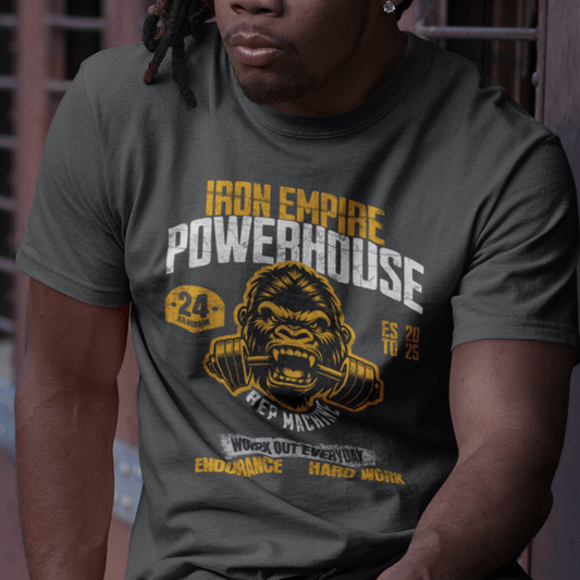Model wearing unisex gym graphic t-shirt with “Iron Empire Powerhouse” gorilla design, casual cotton tee by LostLogicCo Canada