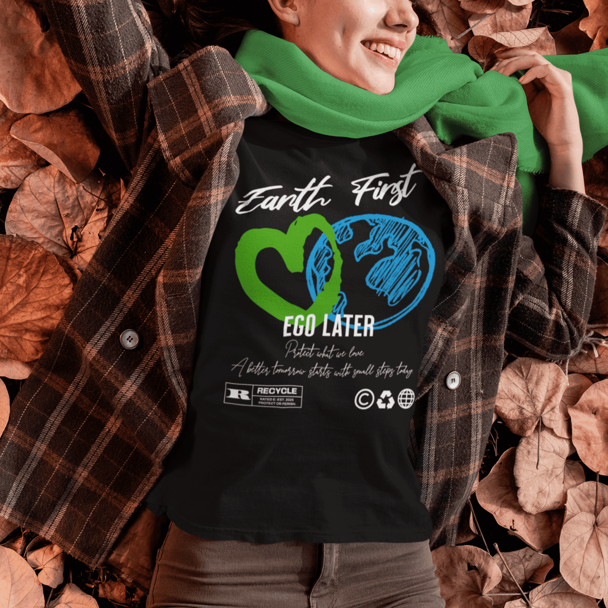 Model wearing “Earth First Ego Later” eco-awareness t-shirt with green heart and planet design, unisex cotton tee by LostLogicCo Canada