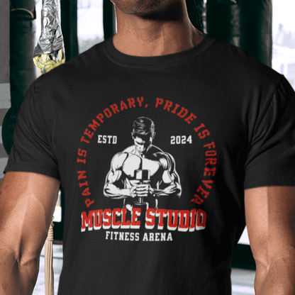Model wearing “Muscle Studio Fitness Arena” motivational gym t-shirt with weightlifter illustration, unisex cotton tee by LostLogicCo Canada