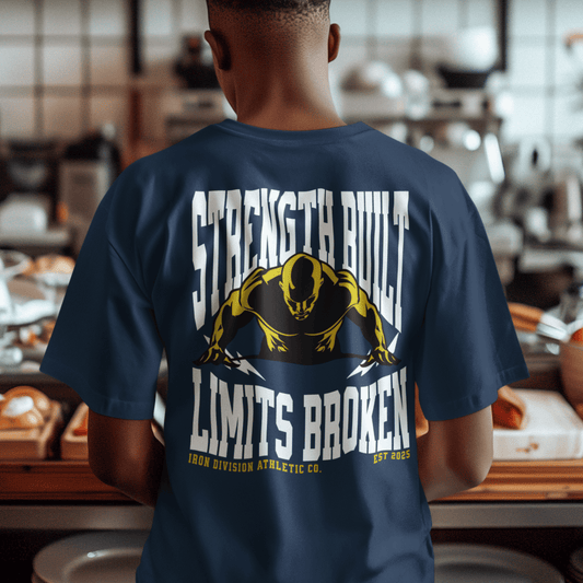 Model showing back design “Strength Built Limits Broken” on black unisex t-shirt, motivational gym tee by LostLogicCo Canada