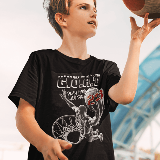 Child wearing youth basketball t-shirt with “G.O.A.T Slam Dunk 23” graphic design, casual short sleeve sports tee by LostLogicCo Canada