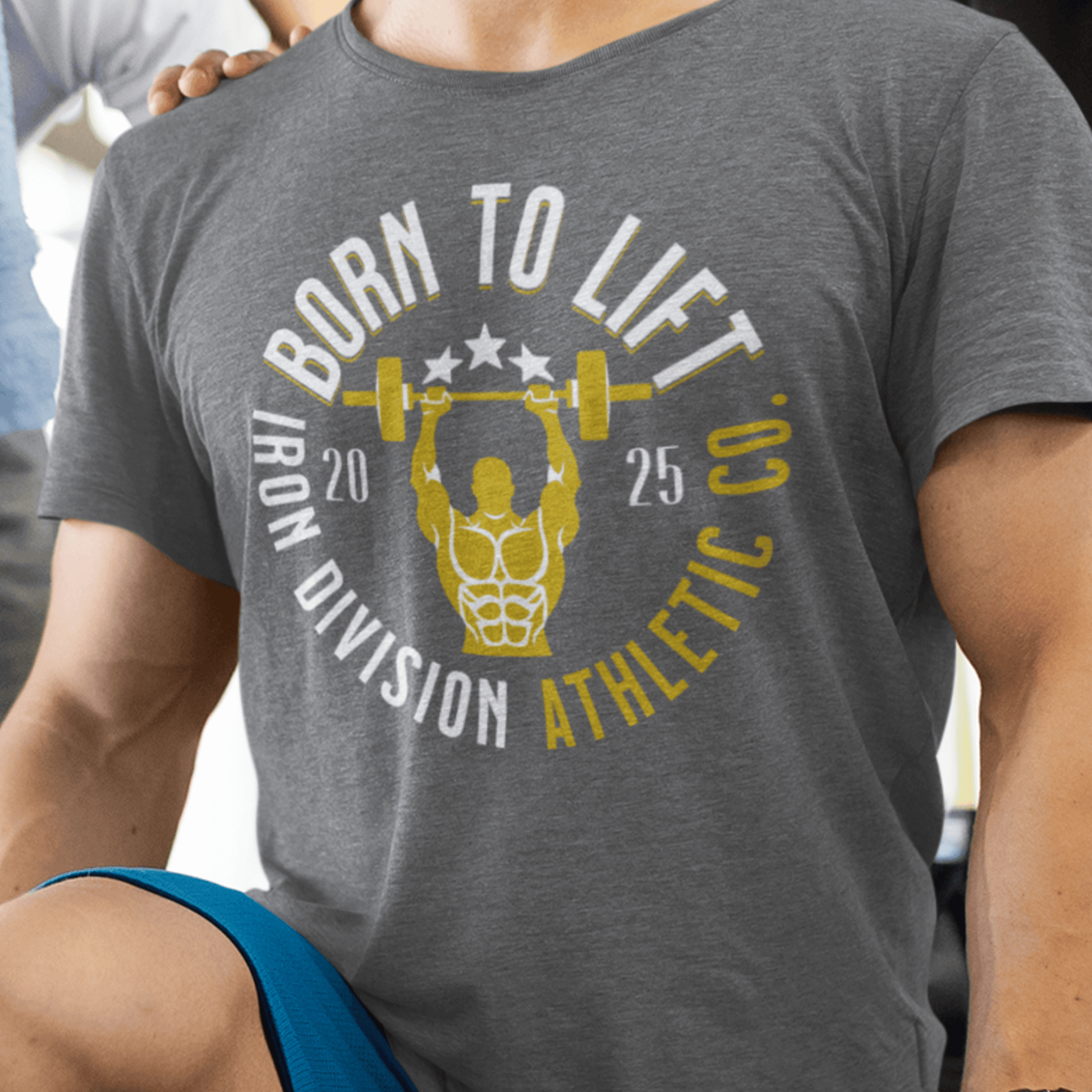 Model wearing “Born To Lift Iron Division Athletic Co.” gym t-shirt with barbell lifter print, unisex classic tee by LostLogicCo Canada