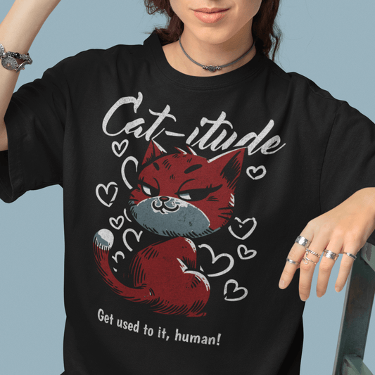 Model wearing “Cat-itude Get Used to It Human” funny cat t-shirt with red cat graphic and bold typography, unisex sports tee by LostLogicCo Canada