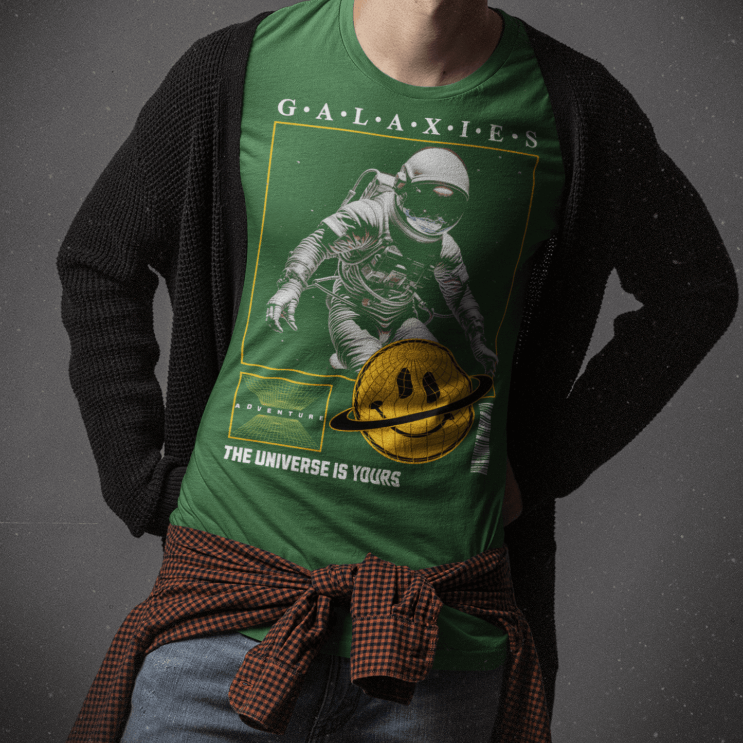 Youth wearing “Galaxies” kids astronaut t-shirt with cosmic design, sporty moisture-wicking youth tee by LostLogicCo Canada