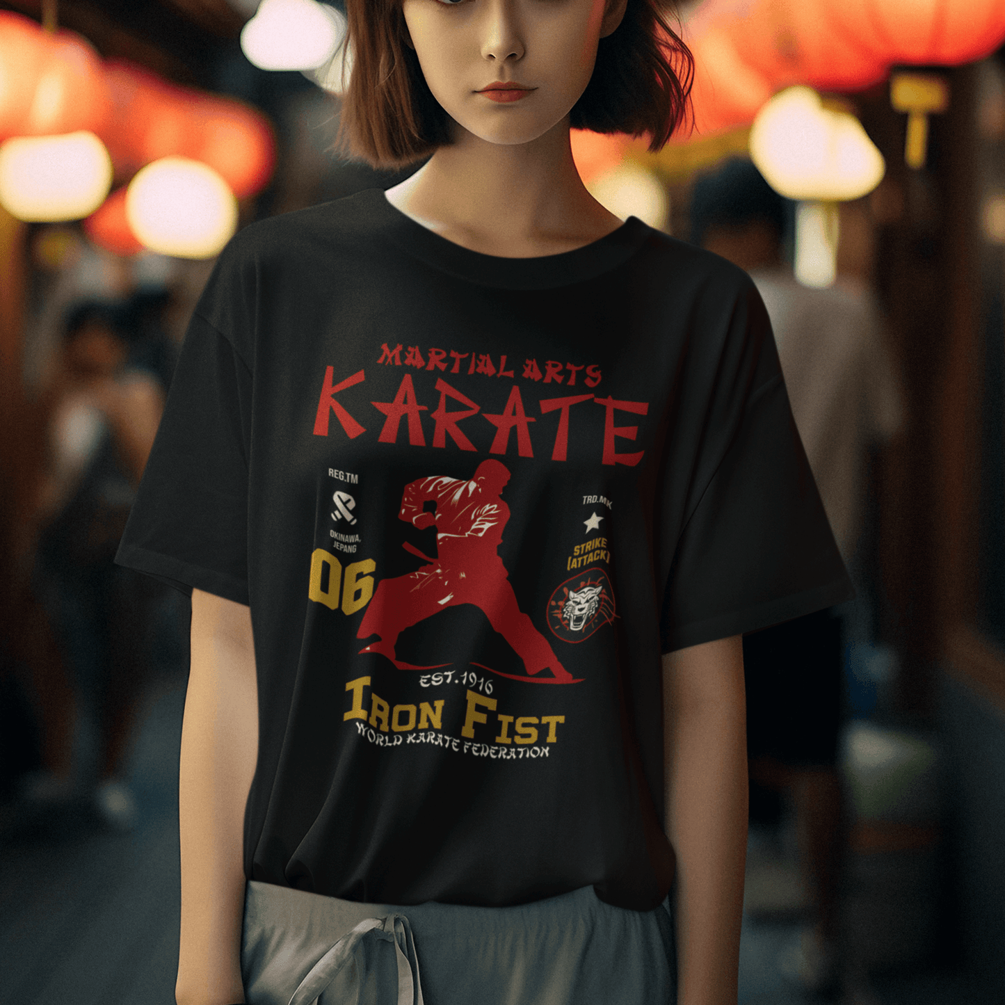 Model wearing unisex martial arts t-shirt with “Iron Fist Karate” design, casual softstyle cotton tee by LostLogicCo Canada