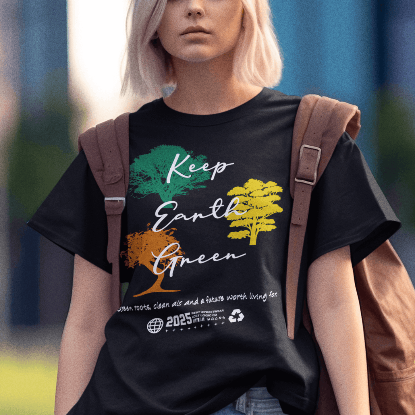 Model wearing “Keep Earth Green” unisex t-shirt with tree artwork and environmental message, soft cotton tee by LostLogicCo Canada