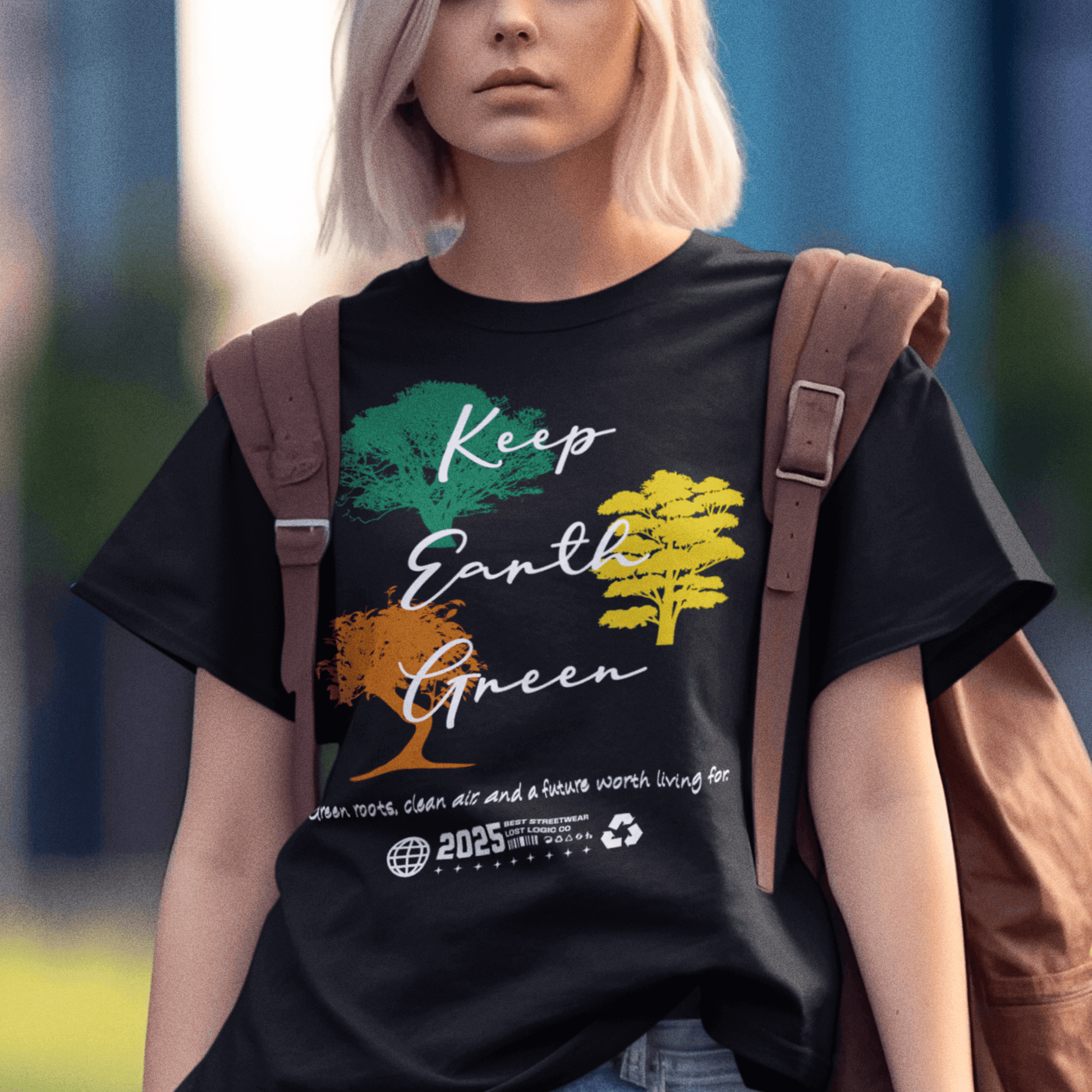 Model wearing “Keep Earth Green” unisex t-shirt with tree artwork and environmental message, soft cotton tee by LostLogicCo Canada