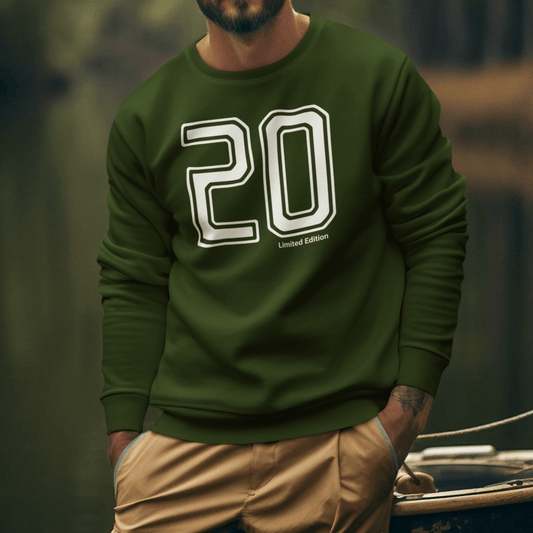 Model wearing green crewneck sweatshirt featuring bold outlined “20” number design, unisex minimal streetwear by LostLogicCo Canada