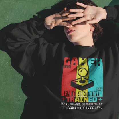 Child wearing youth gaming sweatshirt with retro arcade design and bold typography, fun gamer apparel by LostLogicCo Canada