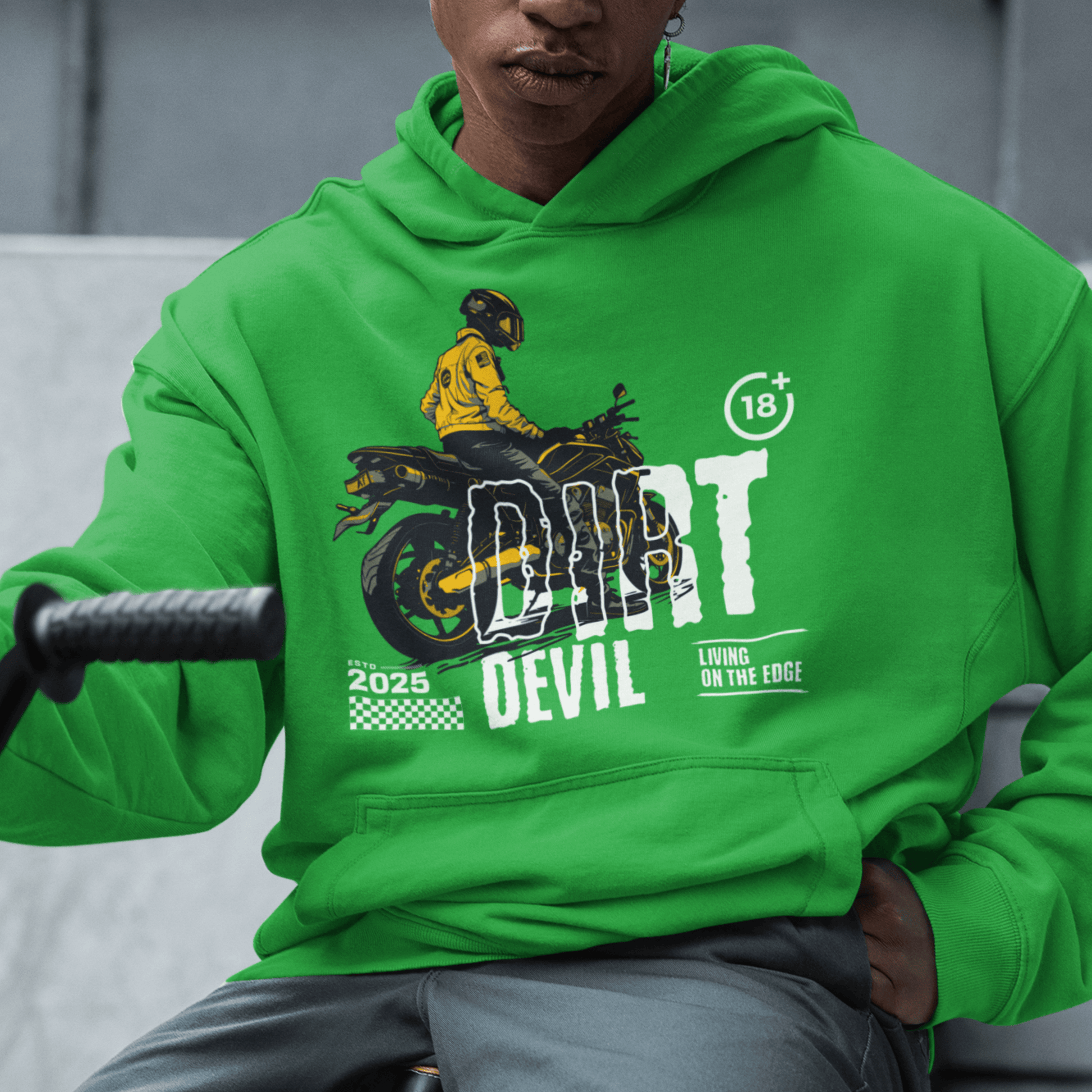 Model wearing green motorcycle hoodie with “Dirt Devil” bold design and biker artwork, unisex streetwear hoodie by LostLogicCo Canada