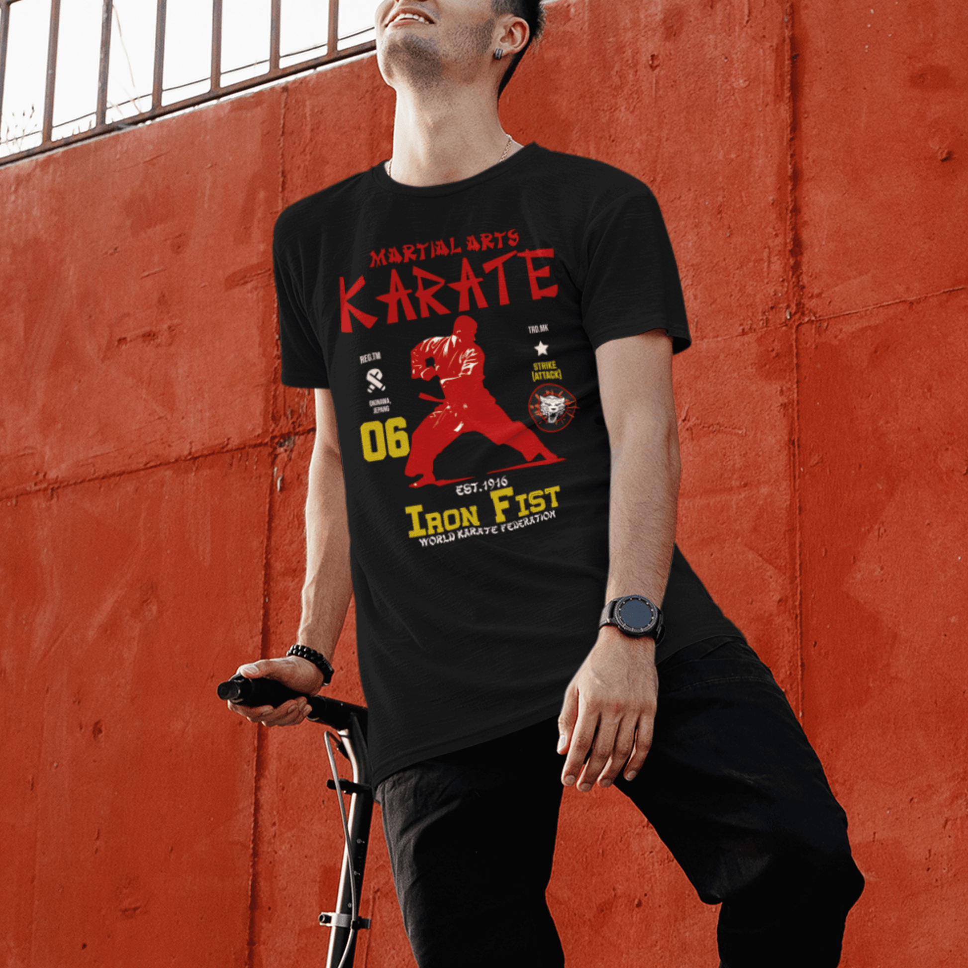 Model wearing unisex martial arts t-shirt with “Iron Fist Karate” design, casual softstyle cotton tee by LostLogicCo Canada