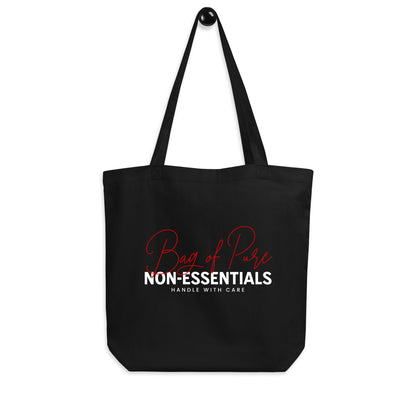 Eco tote bag with “Bag of Pure Non-Essentials Handle with Care” typography design in red and white on black organic cotton by LostLogicCo Canada.