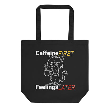 Eco tote bag with “Caffeine First Feelings Later” funny cat design in black, yellow, and red on organic cotton by LostLogicCo Canada.