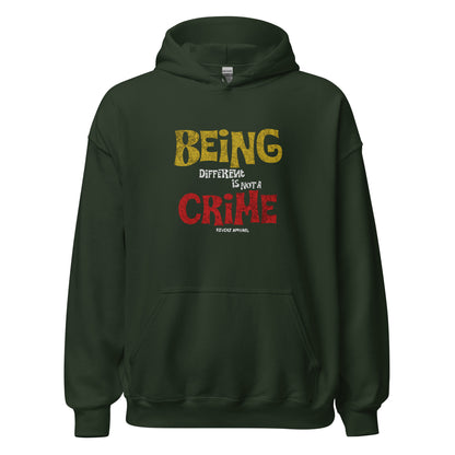 Unisex hoodie with yellow and red distressed typography reading “Being Different Is Not a Crime,” black fleece hoodie by LostLogicCo Canada