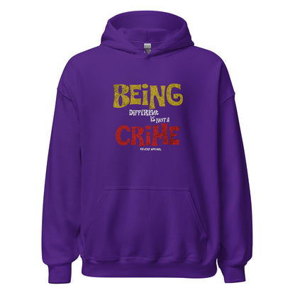 Unisex hoodie with yellow and red distressed typography reading “Being Different Is Not a Crime,” black fleece hoodie by LostLogicCo Canada
